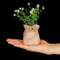 Art.10535 Planta Con Flor Base De Yute 15cm 1pz