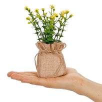 Art.10535 Planta Con Flor Base De Yute 15cm 1pz