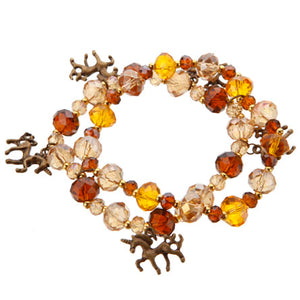 Pulsera Con Cristales Topacio-Miel Con Dijes Unicornio