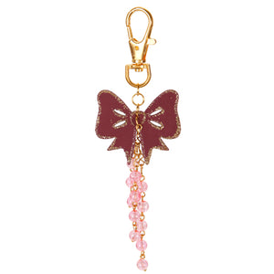Llavero Con Moño Y Cuenta Cristal Rosa