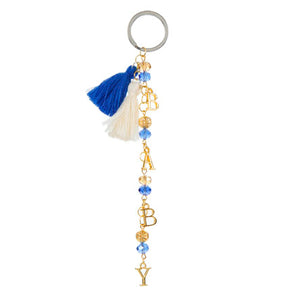 Llavero Baby Azul Oro Con Borlas