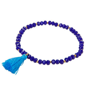 Pulsera De Rondeles Azul Y Crimp Oro Con Borla